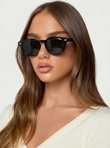 Klassische schwarze Sonnenbrille mit rundem Gestell für Damen und Herren, UV-Schutz.