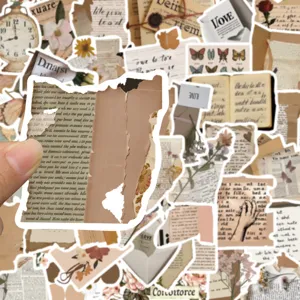 Detailed close-up view of vintage scrapbooking stickers showing retro letter and botanical designs.
