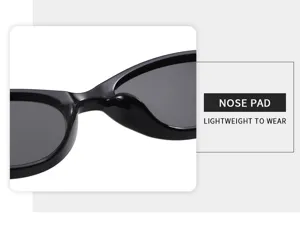 Sonnenbrille Detailansicht zeigt die bequeme Nasenbrücke und glatte schwarze ovale Rahmenstruktur.
