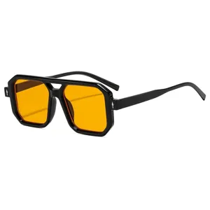 Modische Piloten-Sonnenbrille mit Pfeil für Damen und Herren, schwarzes Gestell mit gelben Gläsern.