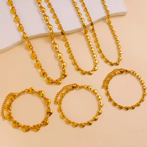 Gold heart link chain necklace bracelet set, fashion stainless steel jewelry for women daily wear.