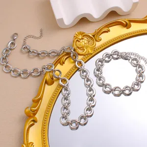 Stainless steel chunky O-chain necklace and bracelet set, geometric hip-hop jewelry detail shot.