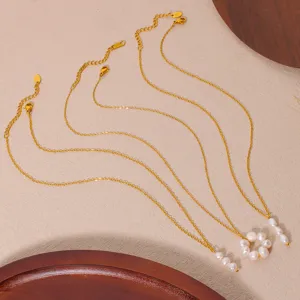 Details of the 18k gold stainless steel pearl pendant necklace with delicate chain layers.