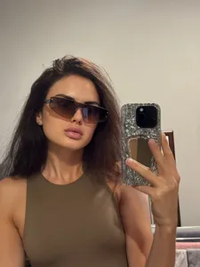 Stylish one-piece lens sunglasses for women and men, UV protection outdoor eyewear.