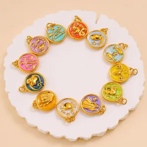 Detailed shot of colorful enamel zodiac pendants set, 18k gold plated stainless steel.