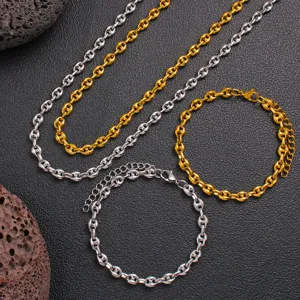 Stainless steel coffee bean chain necklace and bracelet detail shot, gold and silver jewelry.