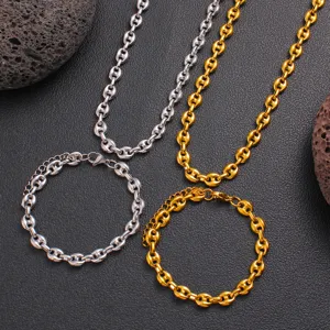 Stainless steel coffee bean necklace and bracelet set in gold and silver, detailed view.