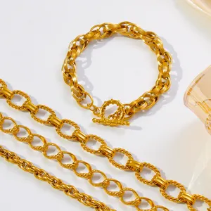 Detail view of gold plated titanium steel thick twist chain bracelet with toggle clasp.