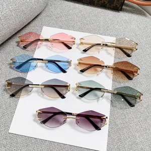 Trendy rimless polygon sunglasses with gradient candy color lenses for stylish daily wear.