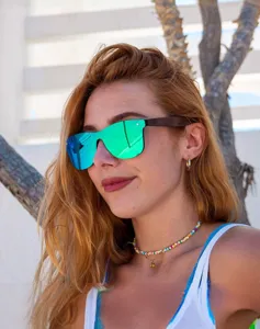Trendy stylish mirrored sunglasses with wooden temples for women outdoor UV protection.