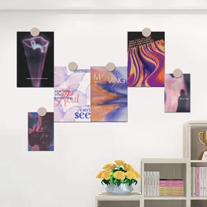 Aesthetic movie art poster set details showing wall display with stylish text and abstract prints.