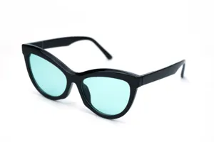 Black cat-eye sunglasses with teal lenses for women stylish vintage beach eyewear detail view.