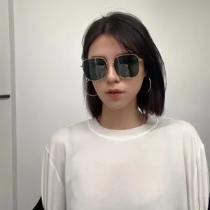 Polarized sunglasses for women, metal square frame, UV protection oversized shades.