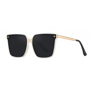 Oversized square sunglasses for women, fashionable chic black lenses with beige frame and gold.