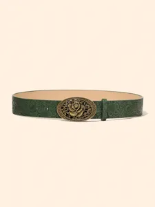 Vintage floral carved metal buckle detail on dark green embossed leather women belt.