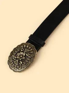 Detailed view of vintage western retro style black leather belt with bronze floral carved oval buckle.