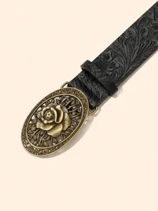 Close-up detail of vintage rose carved oval metal buckle black embossed leather belt.