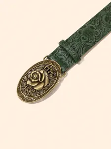 Vintage embossed green leather belt with ornate bronze floral oval buckle detail close-up.