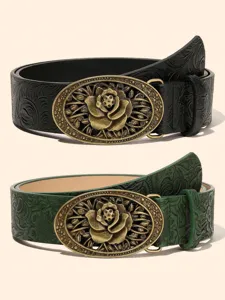Vintage embossed floral metal buckle leather belt for women, available in black and green colors.