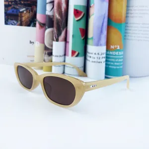 Trendy beige cat-eye sunglasses for women, stylish small frame sun glasses for daily wear.