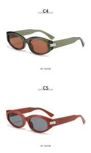 Gafas de sol ovaladas estilo ojo de gato retro con bisagra de metal, mujer chic.