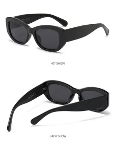 Detail view of black cat-eye sunglasses showcasing temple texture and frame design.