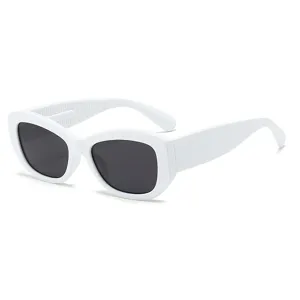White thick frame cat eye sunglasses for women, stylish UV protection fashion street shades.