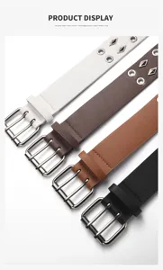 Detailed view of punk style double-prong grommet leather belts in four classic colors.