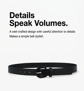 Detailed view of the sleek black women's leather belt with a delicate metal pin buckle.