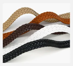 Detail shot of women's braided PU leather belt showcasing intricate weave texture and multiple colors.