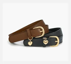 Detailed view of women PU leather belt with cute gold heart pendant and metal buckle versatile.