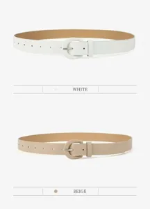 Minimalist women thin leather belt with round buckle, casual dress pants waist accessory.