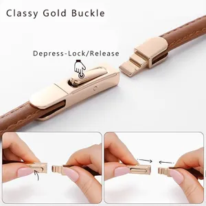 Detailed view of the elegant brown leather belt featuring a secure gold spring push lock buckle.