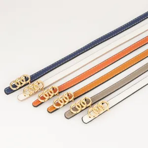 Women's thin leather belt featuring a chic triple interlocking gold ring buckle for jeans.
