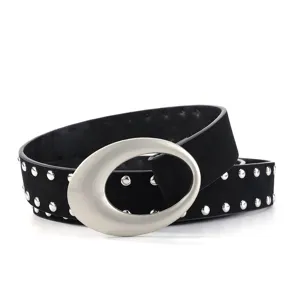 Black suede rivet belt detail showing silver oval buckle and metal studs for women.