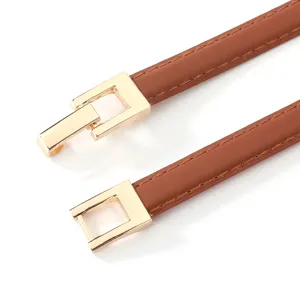 Women thin brown pu leather belt with gold metal interlocking buckle for dresses coats.