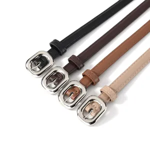 Detailed view of women thin leather belts in four colors with stylish silver square pin buckles.
