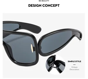 Cyberpunk futuristic oversized sunglasses for women and men, trendy hip-hop style black frame eyewear.