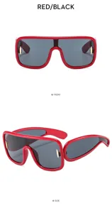 Futuristic cyber punk oversized shield sunglasses with red frame for hip hop fashion.