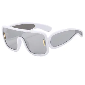 Futuristic big frame sunglasses with white thick frame and grey lenses for trendy streetwear look.