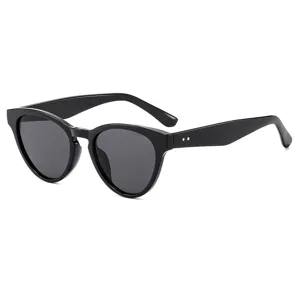Gafas de sol cat-eye retro para mujer, elegante montura negra, diseño protección UV.