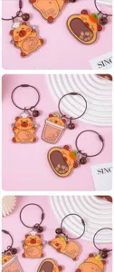 Cute cartoon guinea pig acrylic shaker keychain with steel wire ring and bell ornament.