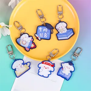 Cute graduation acrylic keychain set with study designs, perfect for student gifts and school bags.