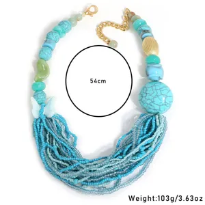 Bohemian multi-layer beaded necklace with turquoise-style beads and butterfly detail