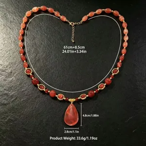 Detailed measurement view of orange resin beaded necklace with teardrop pendant and weight