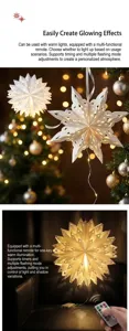 Detail view of paper star lantern with warm LED lights and remote for holiday decor.