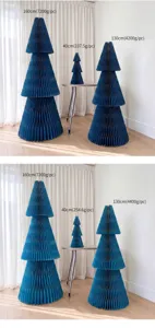 Blue accordion paper honeycomb Christmas tree ornament, folded holiday party decor display.