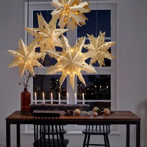 Weihnachtliche dekorative Stern Papierlaterne Anhänger für festliche Fensterbeleuchtung.