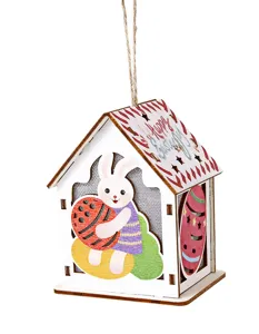 Detailed view of the Easter wooden hanging house ornament with cute bunny and painted egg.