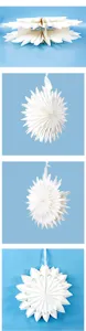 Detailed close-up view of white 3d paper star snowflake hanging decoration for party decor.